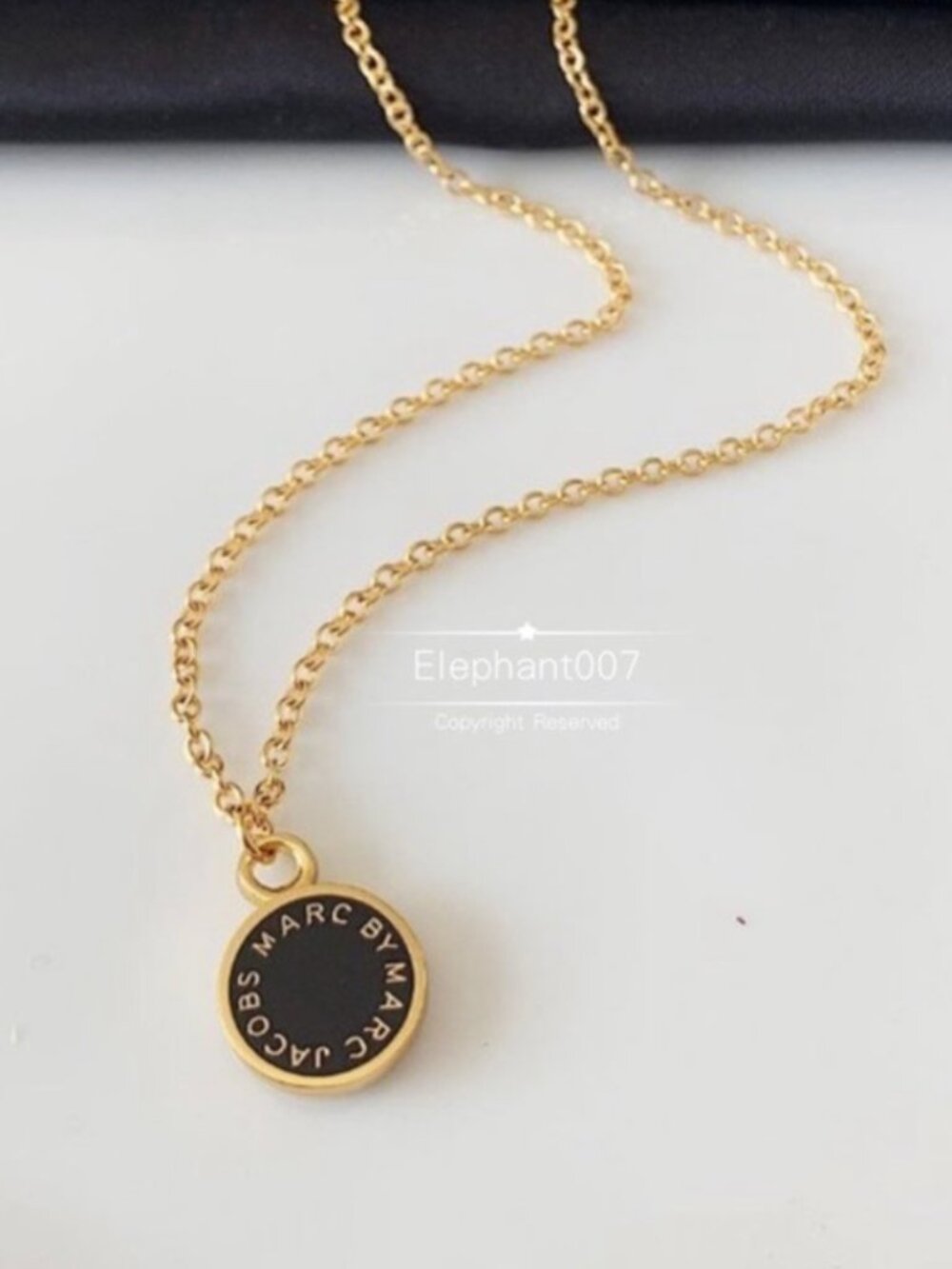Marc by Marc Jacobs Black Enamel Logo Pendant Necklace Gold Tone Disc Necklace
